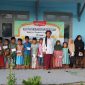 Sejumlah Anak Yatim  Swafoto Bersama Usai Pemberian Santunan.  Sumber Foto: Dok FAMMUR.