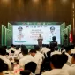 Bupati Pamekasan Baddrut Tamam saat memberikan sambutan di acara launching Universal Health Coverage (UHC) di Hotel Azana, Jalan Jokotole, Pamekasan.