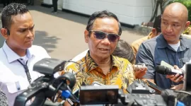Menteri Koordinator Bidang Politik, Hukum, dan Keamanan Mahfud Md dalam keterangannya kepada awak media usai rapat di Kompleks Istana Kepresidenan Jakarta. [Foto: BPMI Setpres]