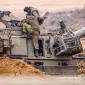 Tentara Israel bersiap untuk melakukan manuver darat di lokasi yang dirahasiakan dekat perbatasan dengan Gaza [Hannibal Hanschke/EPA-EFE]