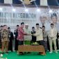 Saat pemotongan tumpeng secara simbolis  milad ke 26 tahun UKM IQDA IAIN Madura (Dok. Kominfo Departemen IQDA IAIN Madura)