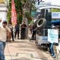 Musfiq, koordinator Relawan Rismaharini Madura Bersatu saat orasi di Surabaya.