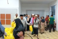 Pegadaian bersama para korban mencapai kesepakatan penyelesaian dan menyalurkan bantuan sembako sebagai bentuk kepedulian di bulan Ramadan.